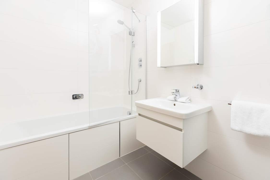 Bedroom 3 has an en suite bathroom.