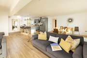 The apartment's fabulous open plan living area is a very sociable space.