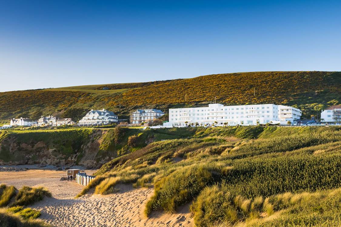 The apartment block sits to the right-hand side of the main hotel.