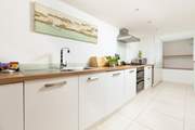 The fully equipped kitchen awaits the first morning brunch!