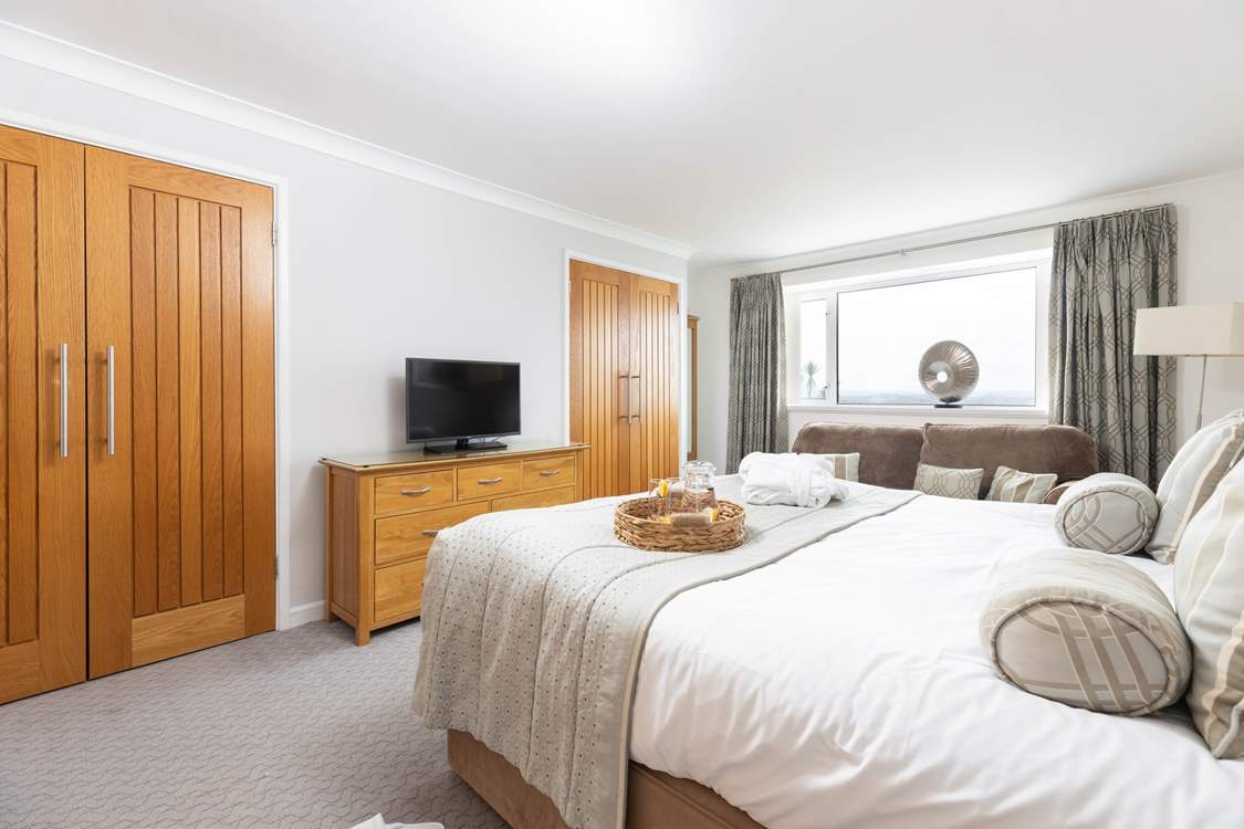 A bedroom that offers space and a view!