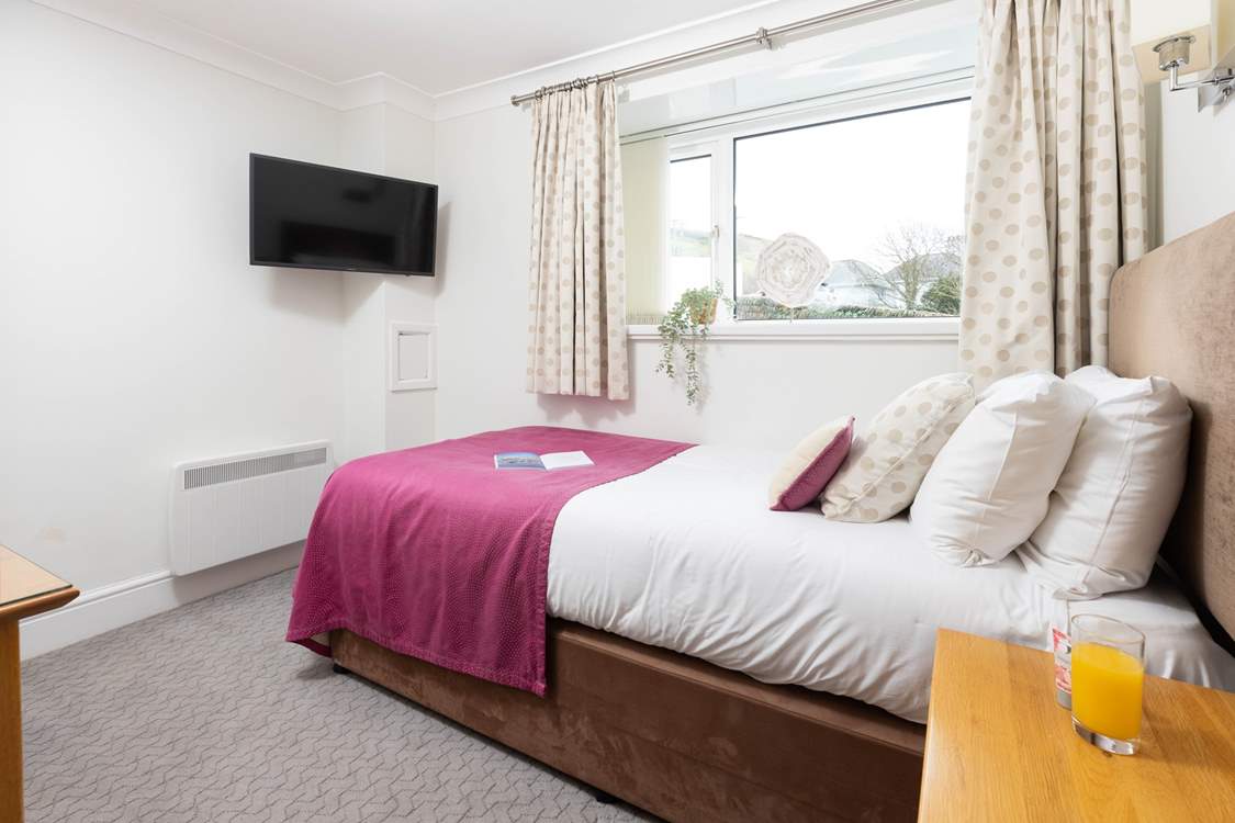 A perfectly positioned single and a quiet little nook for a member of the family.