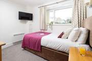 A perfectly positioned single and a quiet little nook for a member of the family.