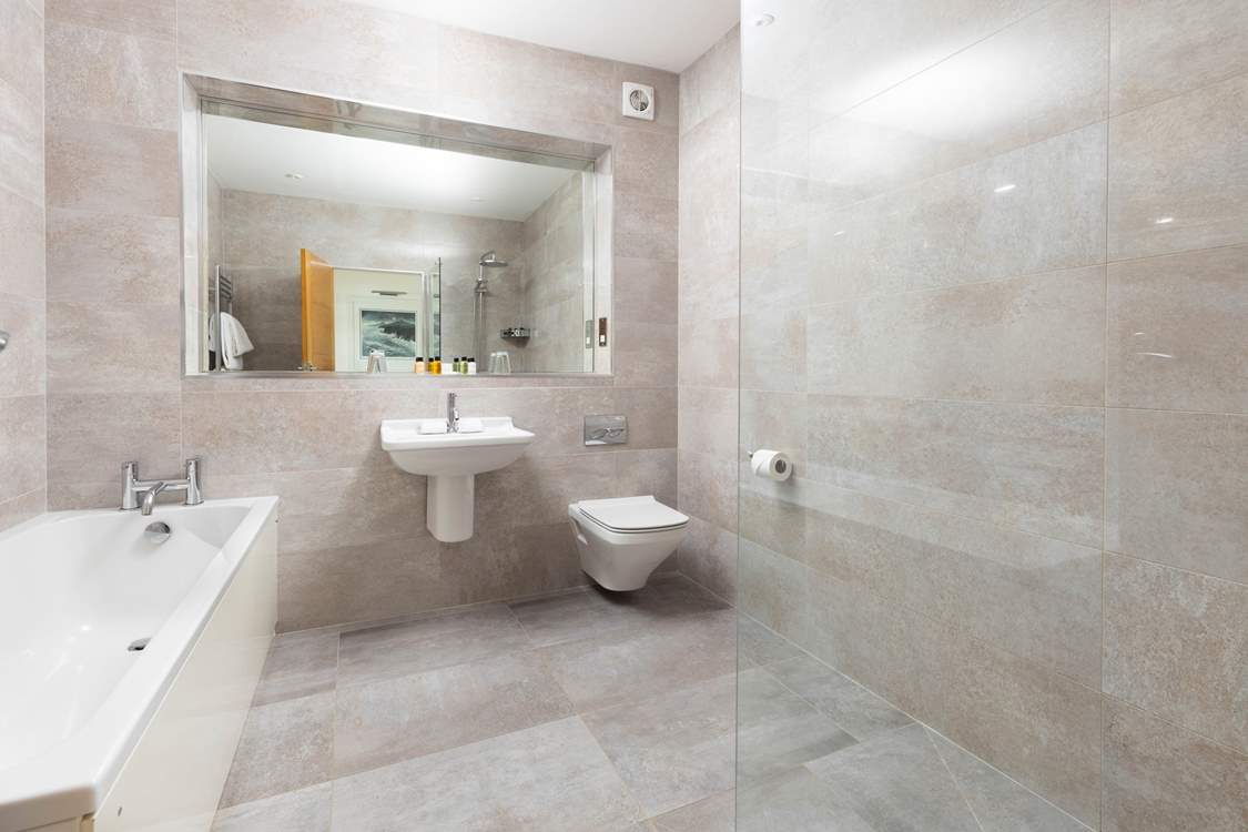 Space and luxury creates the perfect bathroom.