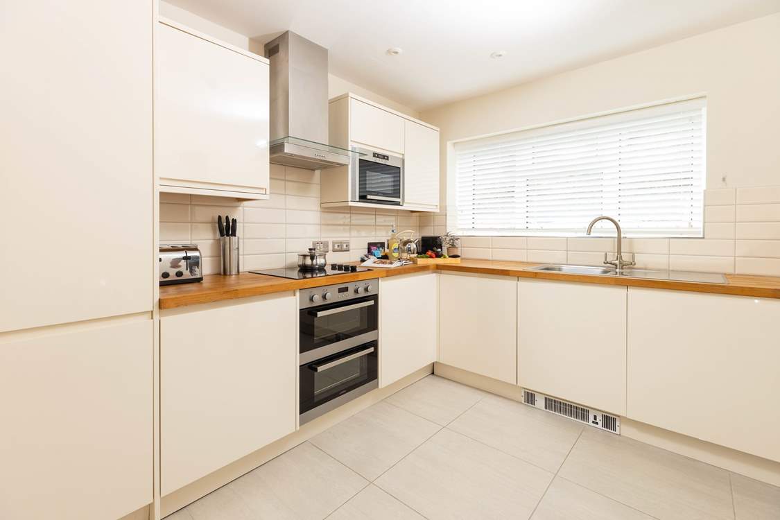 The fully equipped kitchen is ready should you wish to cook up a storm.