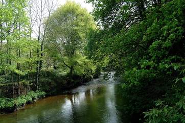 The lane to the cottage is along the edge of the River Lyd.