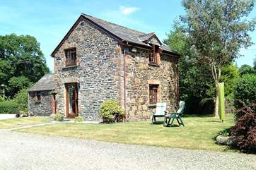 The sunny garden at Leat Mill Cottage.