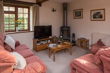 Relax and unwind in the cosy sitting-room.