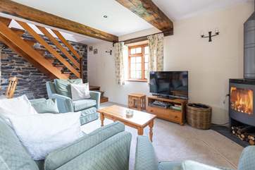 Relax and unwind in the cosy sitting-room.