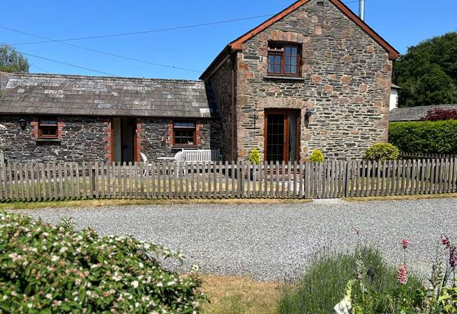 The garden is full enclosed with a handy door off of the sitting room to the grassed garden.