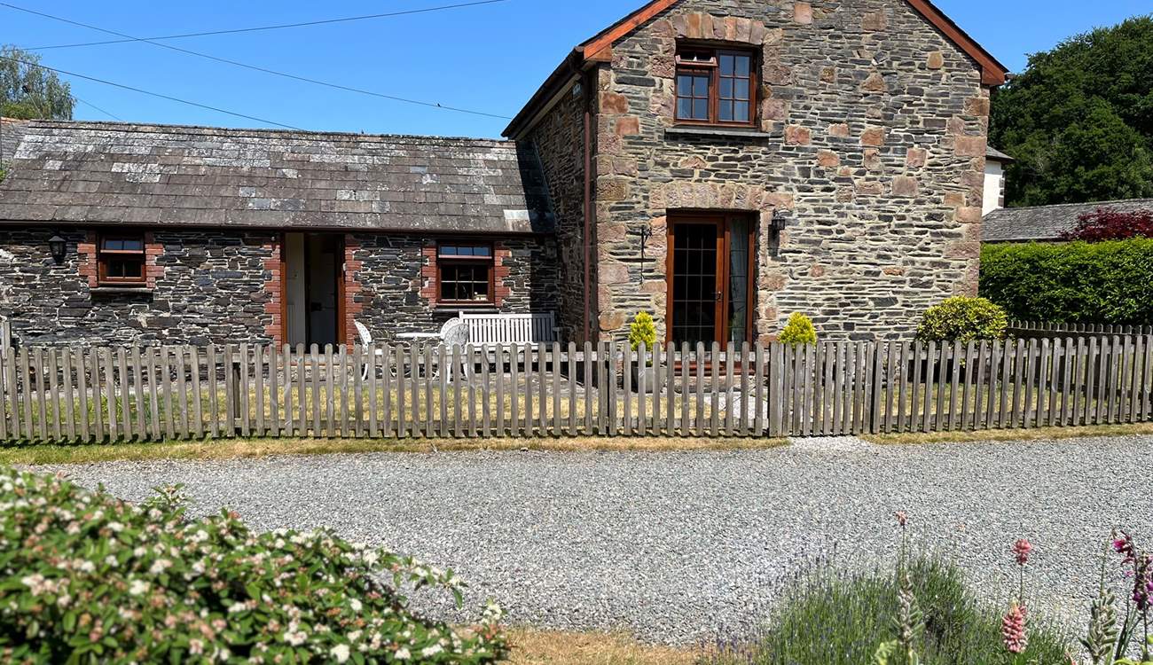 The garden is fully enclosed with a handy door off the sitting-room to the grassed garden.