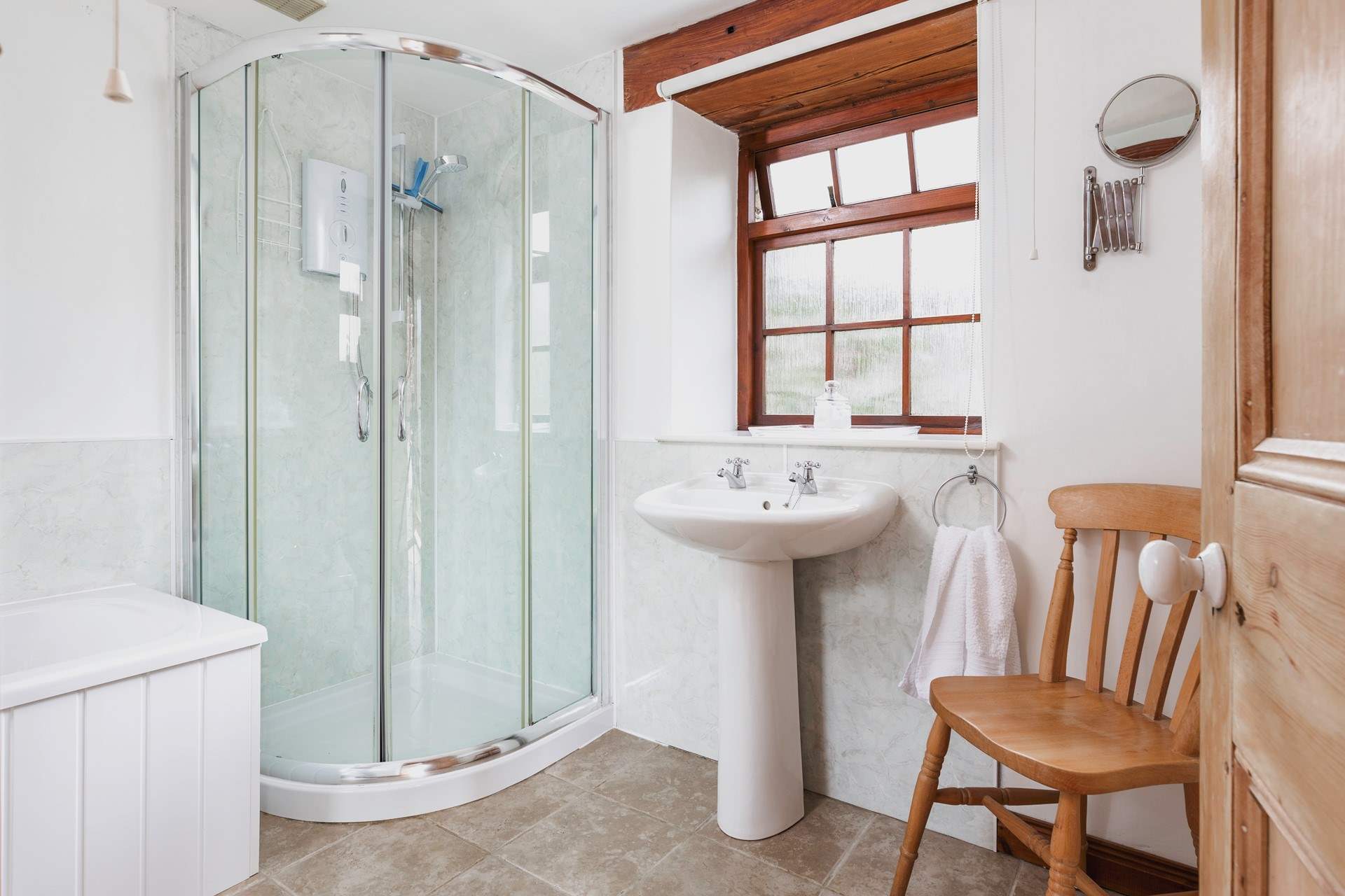 The bathroom offers a shower cubicle and bath - the best of both worlds.