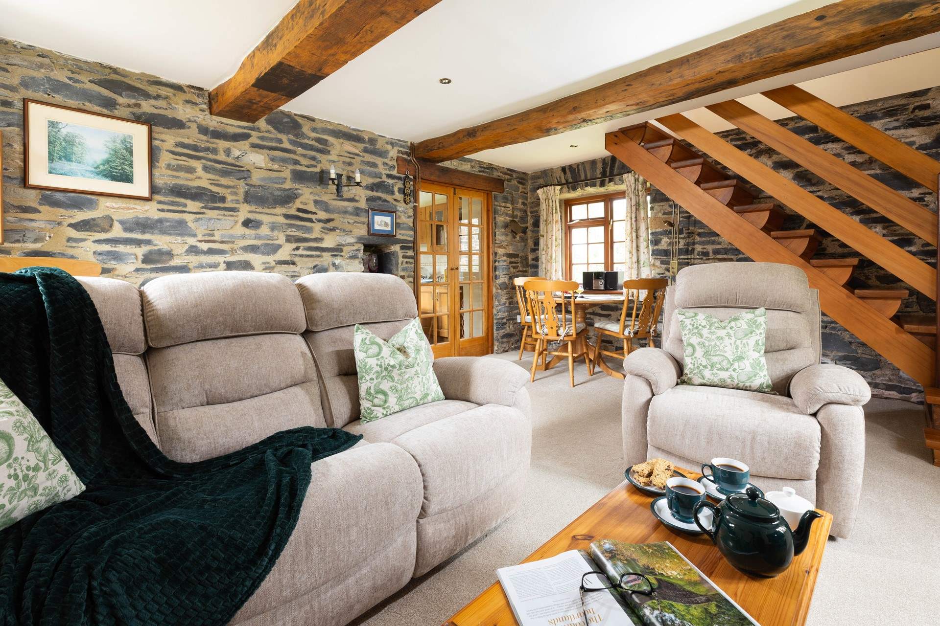 The sitting-room is filled with character and charm!