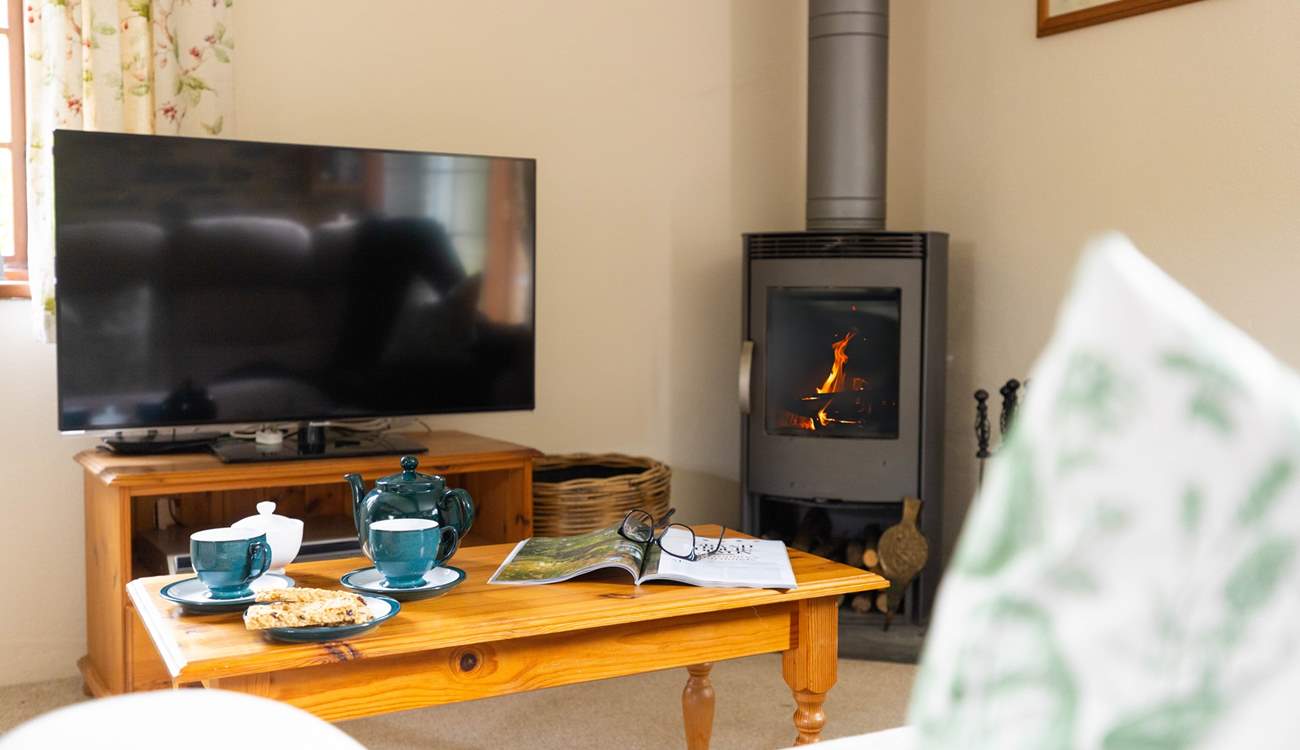 The warming wood-burner is a lovely feature in the sitting/dining-room - ideal after a long walk on the moors.
