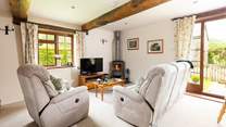 Sit back and enjoy the cosy sitting-room or head out to the garden.
