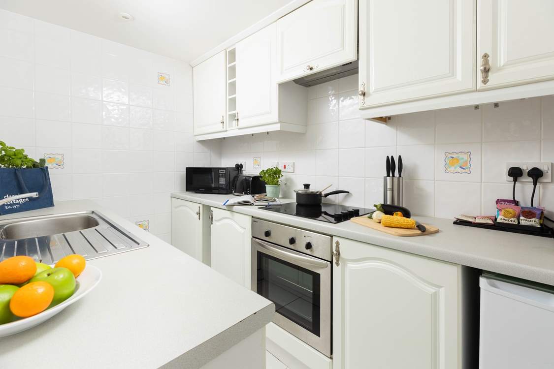 Cooking your holiday meal is easy in this well laid out kitchen.