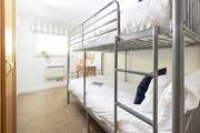 Bedroom 2 has bunk-beds which are suitable for adults and children alike.