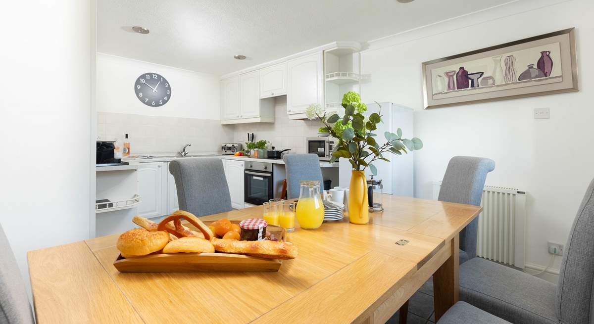 The kitchen and dining area is a great place to come together to plan your day's adventures.