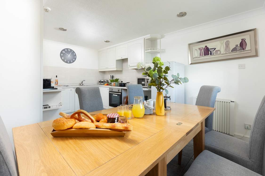 The kitchen and dining area is a great place to come together to plan your day's adventures.