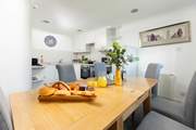 The kitchen and dining area is a great place to come together to plan your day's adventures.