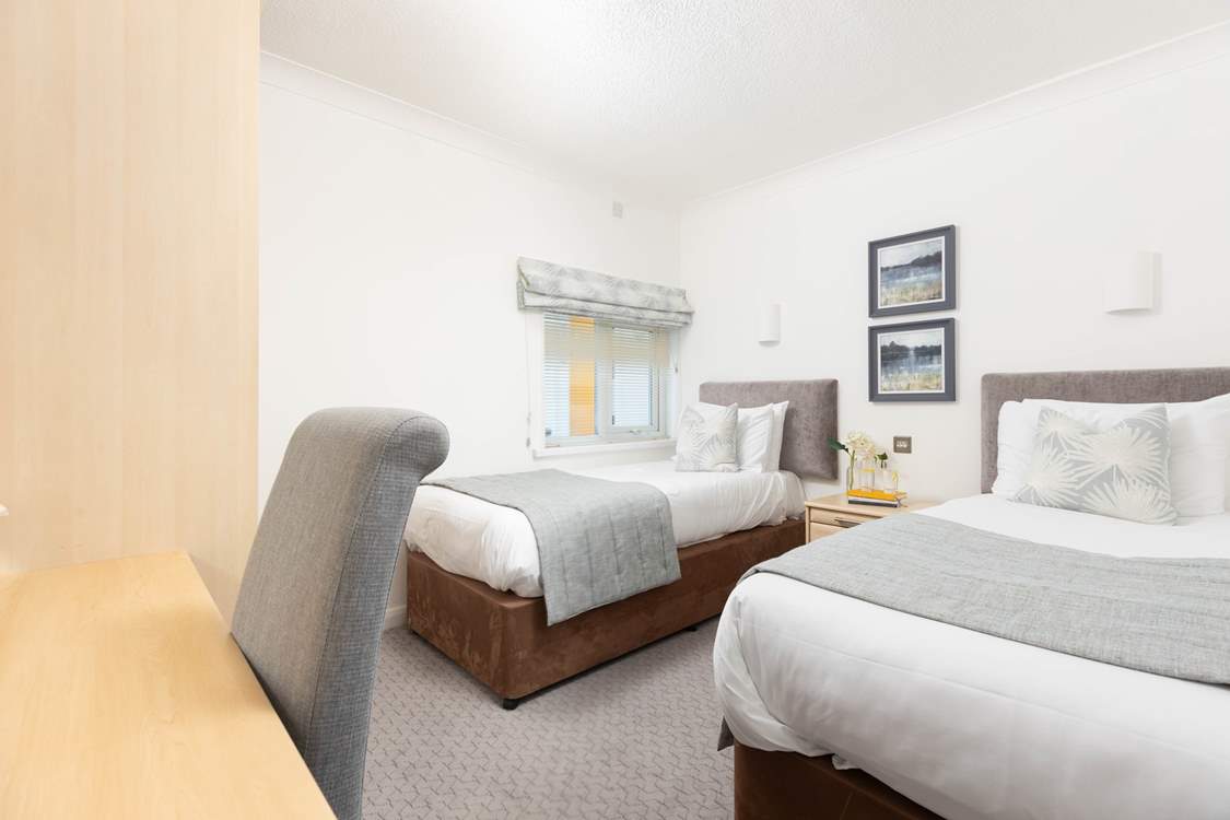 Bedroom 2 sits to the back of the apartment, yet is bright and spacious.