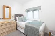 A small but perfectly formed bedroom with the option of a truckle bed.