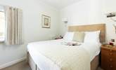 Crisp white linens and a comfy bed - the perfect way to end the day! - Thumbnail Image