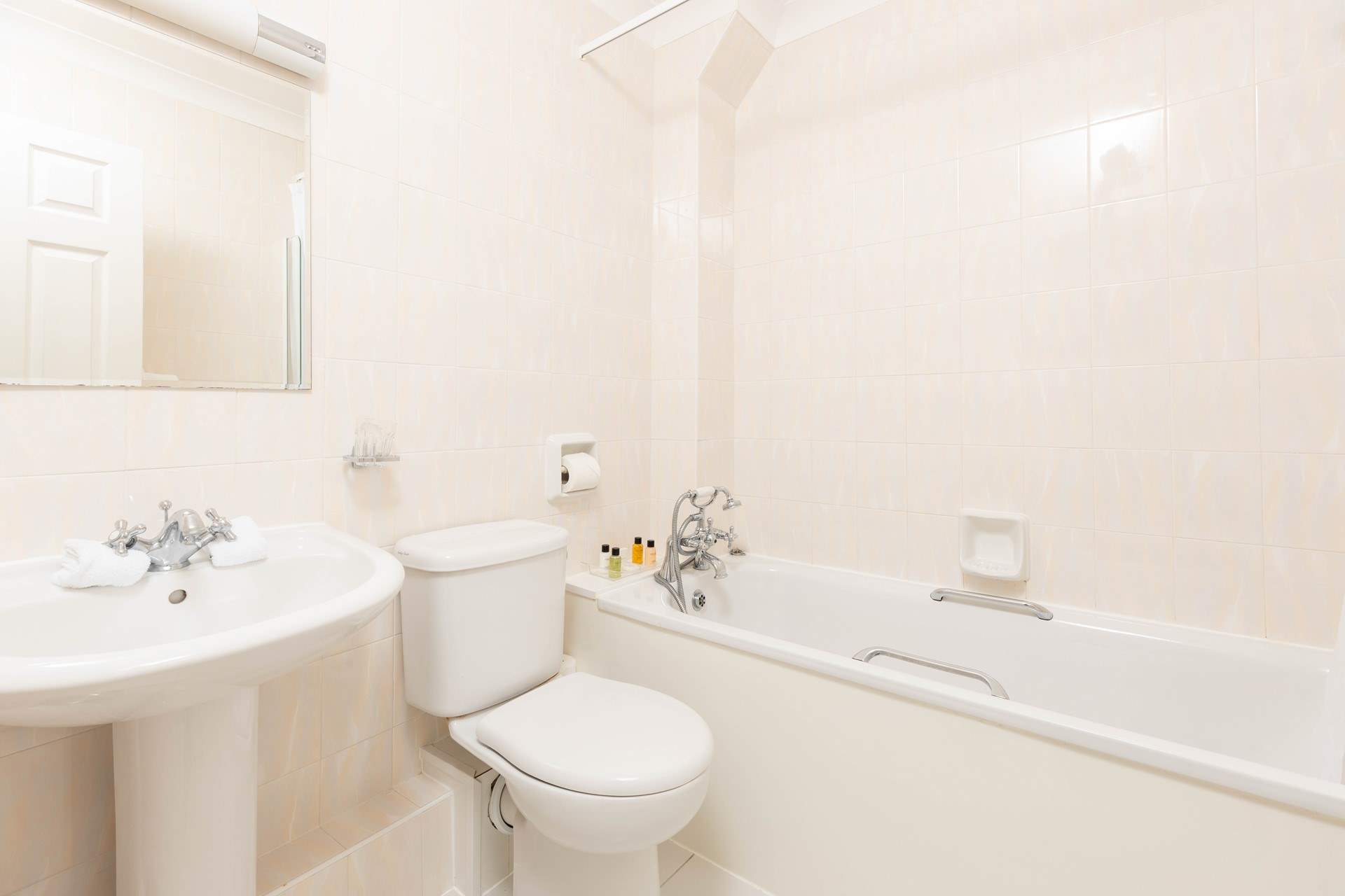 The main bathroom with a shower attachment. 