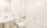 The main bathroom with a shower attachment.  - Thumbnail Image