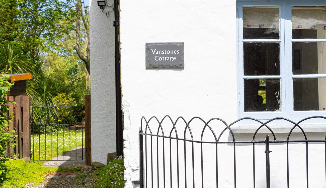 From the parking area follow the gravelled path to the back of the cottage which is the main door. 