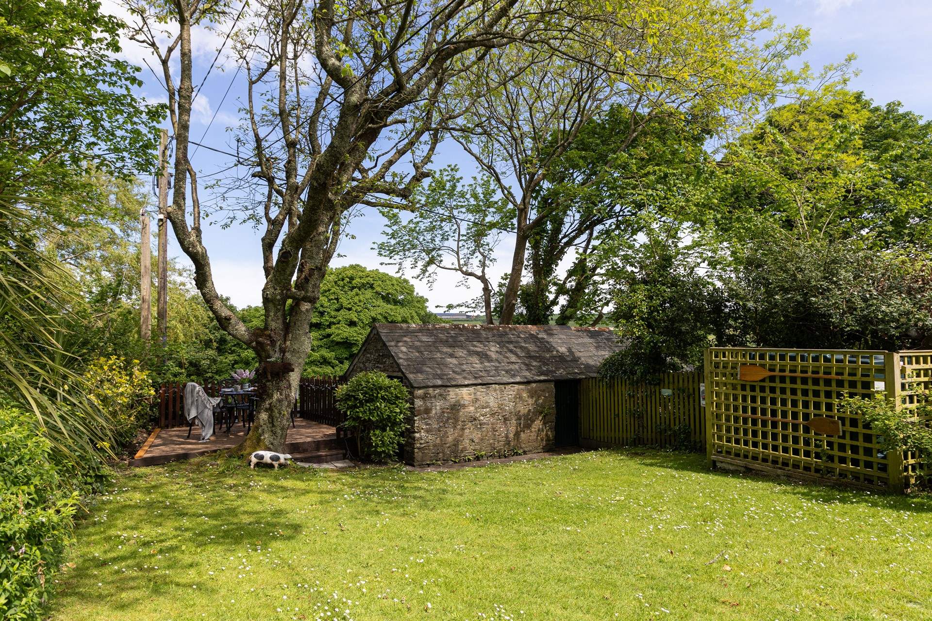 Head down the garden to find the sitting-area.