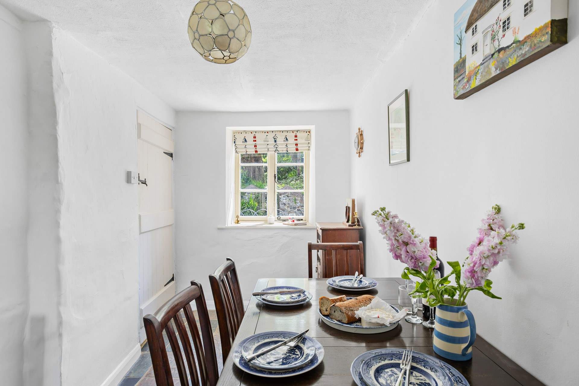 Head through the dining-room and on to the sitting-room.