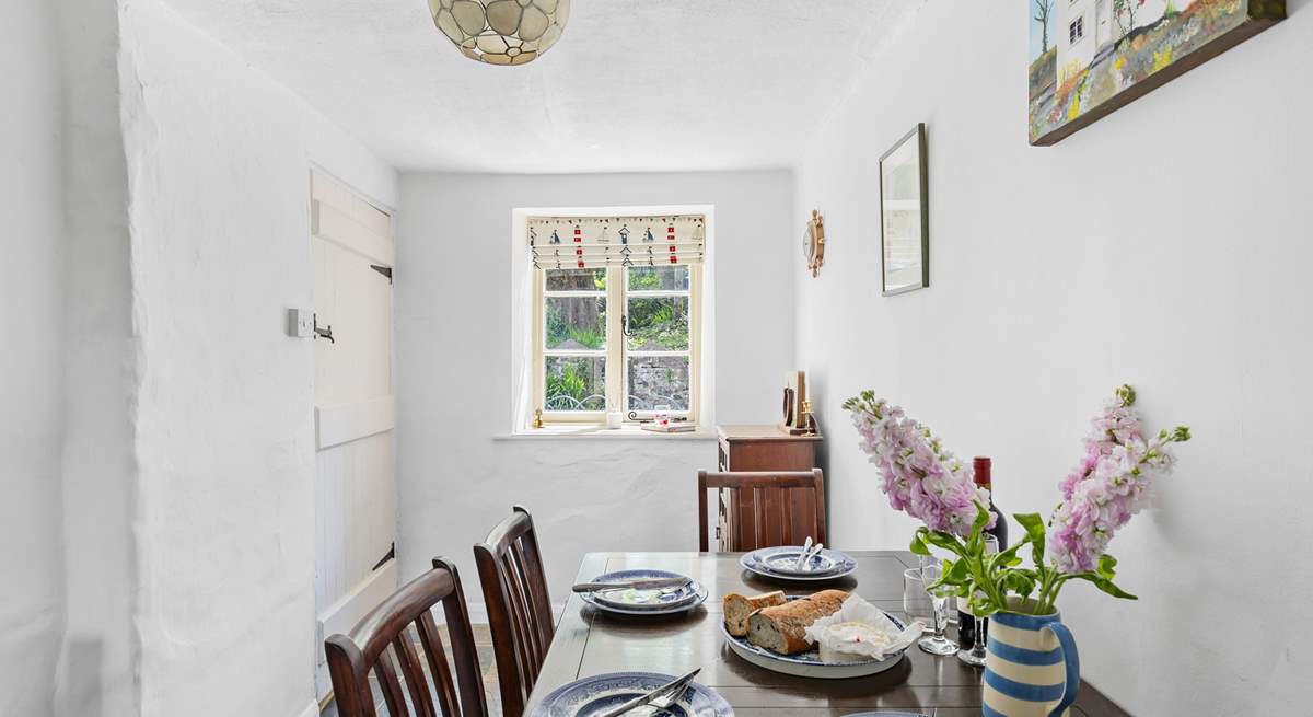 Head through the dining-room and on to the sitting-room.