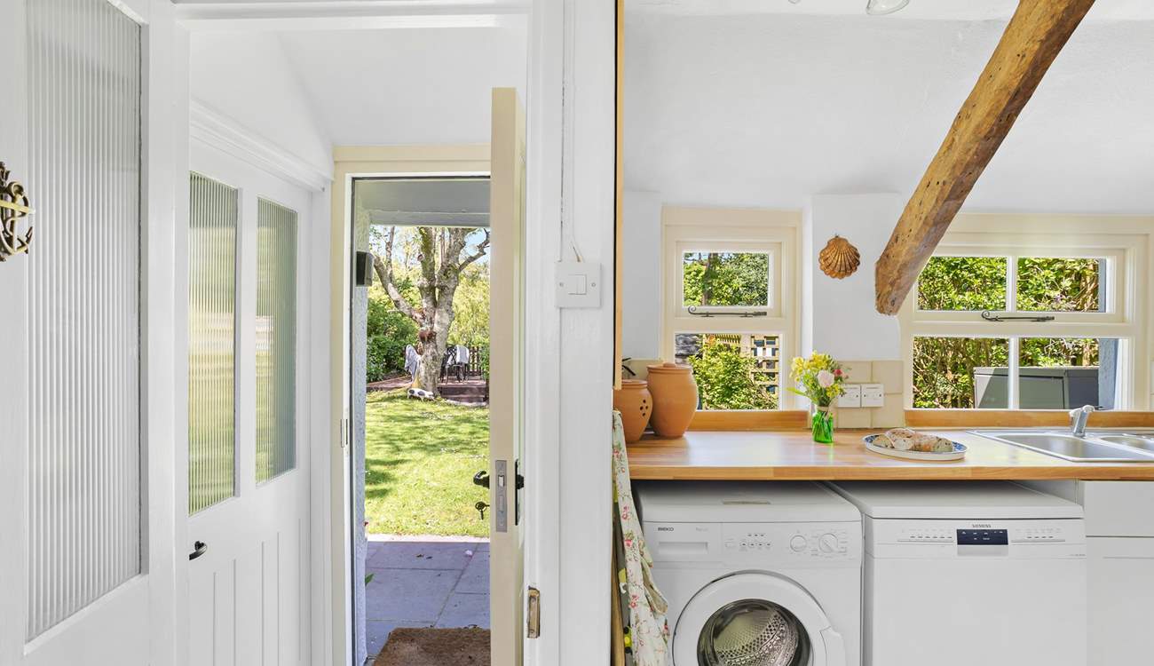 Time to enjoy a gorgeous cottage with a glorious garden. The door on the left is the downstairs bathroom.