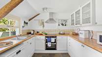 The cottage has had a sympathetic extension creating a modern fitted kitchen, the perfect spot to cook up a feast. 