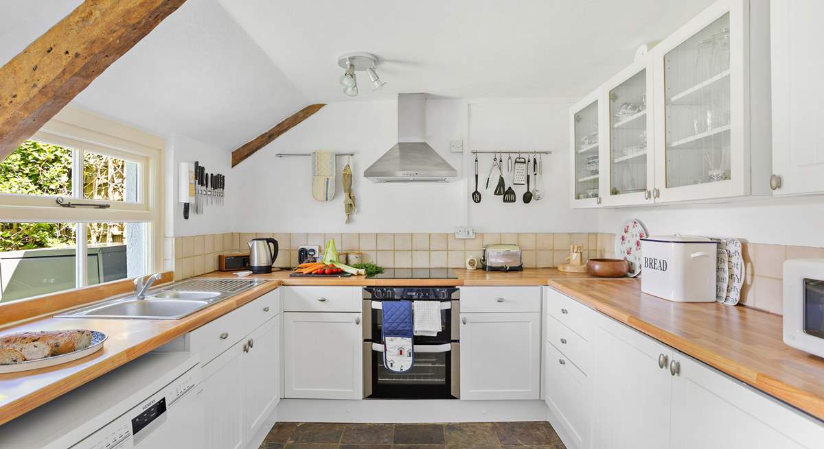 The cottage has had a sympathetic extension creating a modern fitted kitchen, the perfect spot to cook up a feast. 