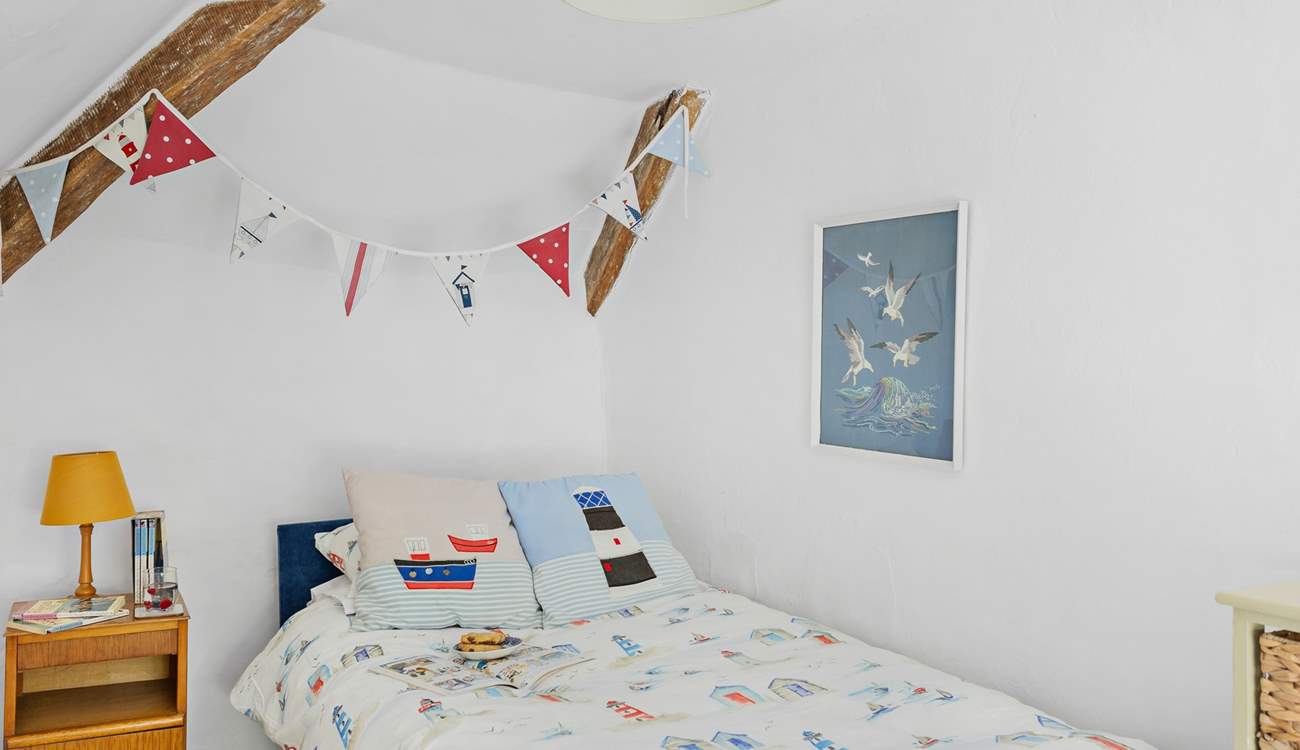 What a lovely bedroom for a younger member of the family.