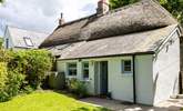 Park the car and walk around to the glorious garden of this thatched cottage. - Thumbnail Image