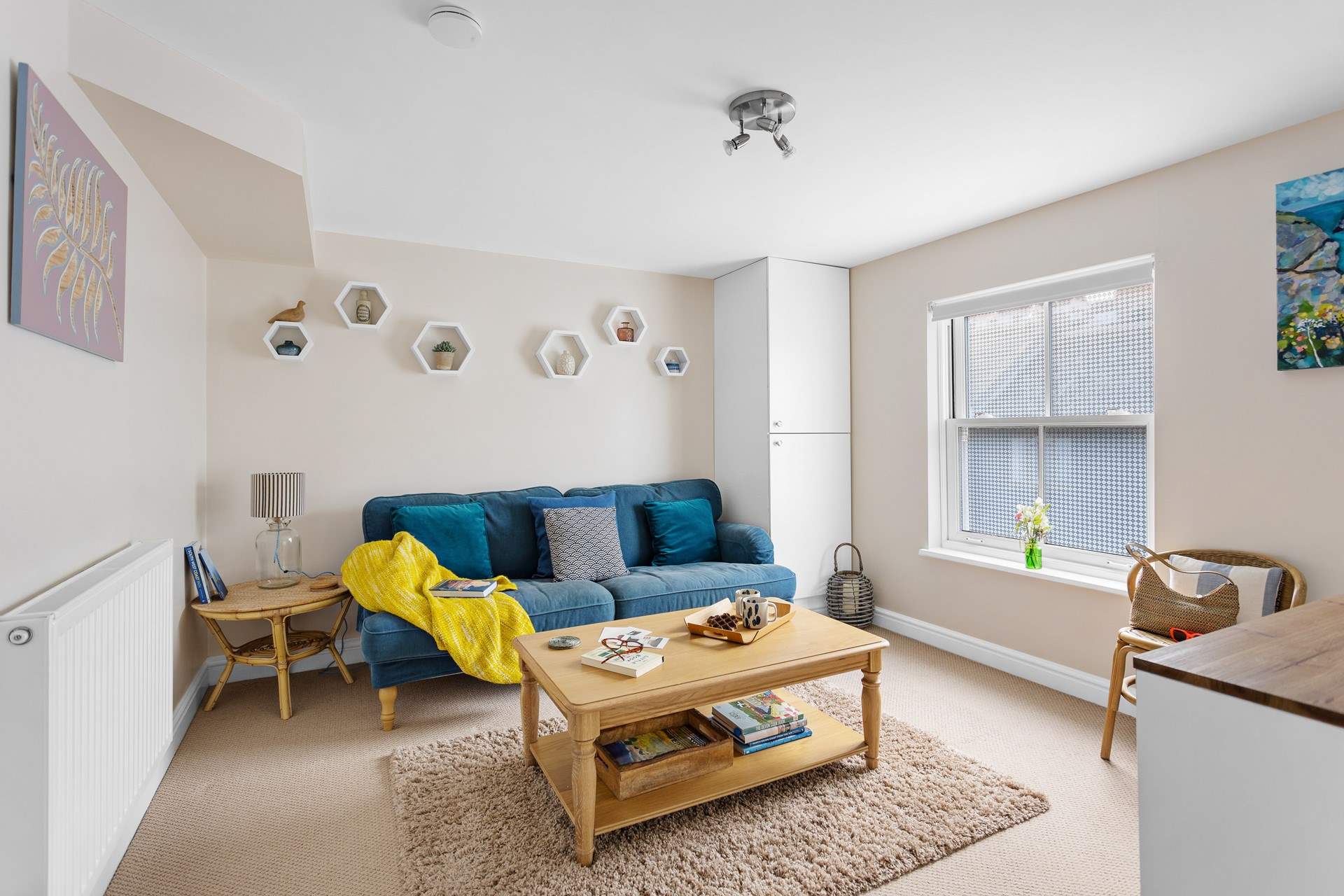 Relax in the sitting-room after walking the coast paths from your front door.