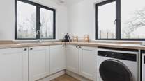At the far end of the house you will find the utility-room with washing machine and tumble-drier.