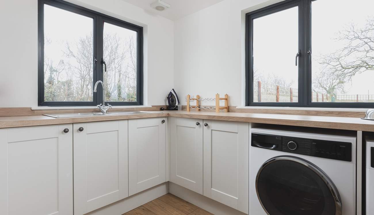 At the far end of the house you will find the utility-room with washing machine and tumble-drier.