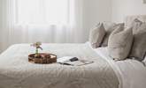 Bedroom one, a restful place to retreat to at the end of each day. - Thumbnail Image