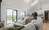 Open plan living at its best. This lovely room leads out to the enclosed garden. - Thumbnail Image