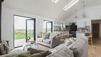 Open plan living at its best. This lovely room leads out to the enclosed garden.