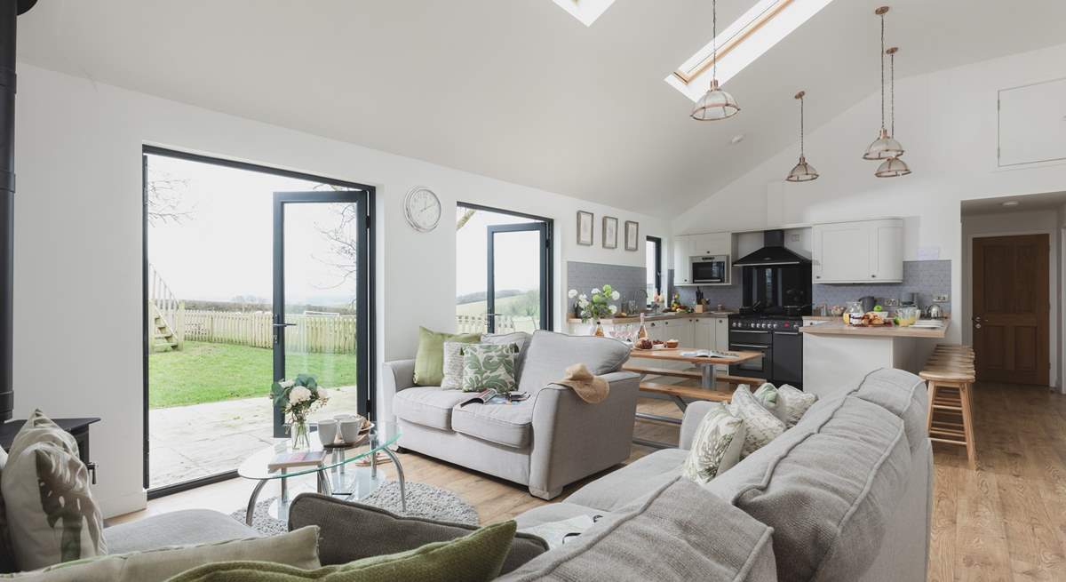 Open plan living at its best. This lovely room leads out to the enclosed garden.