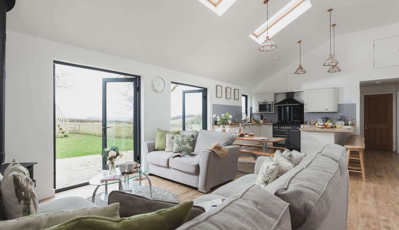 Open plan living at its best. This lovely room leads out to the enclosed garden.