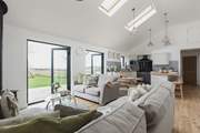 Open plan living at its best. This lovely room leads out to the enclosed garden.