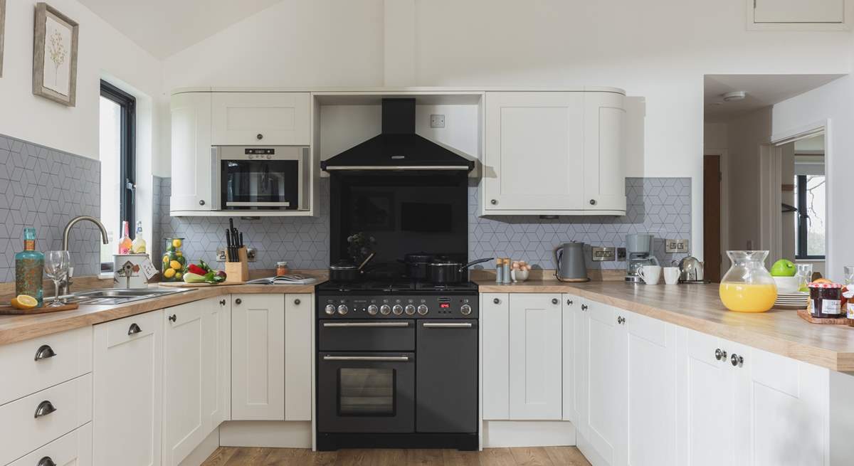 The kitchen is fully equipped, perfect for cooking up a family feast.