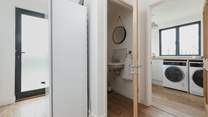 You also have the benefit of another WC with wash-basin. For the overflow food supplies you have another fridge.
