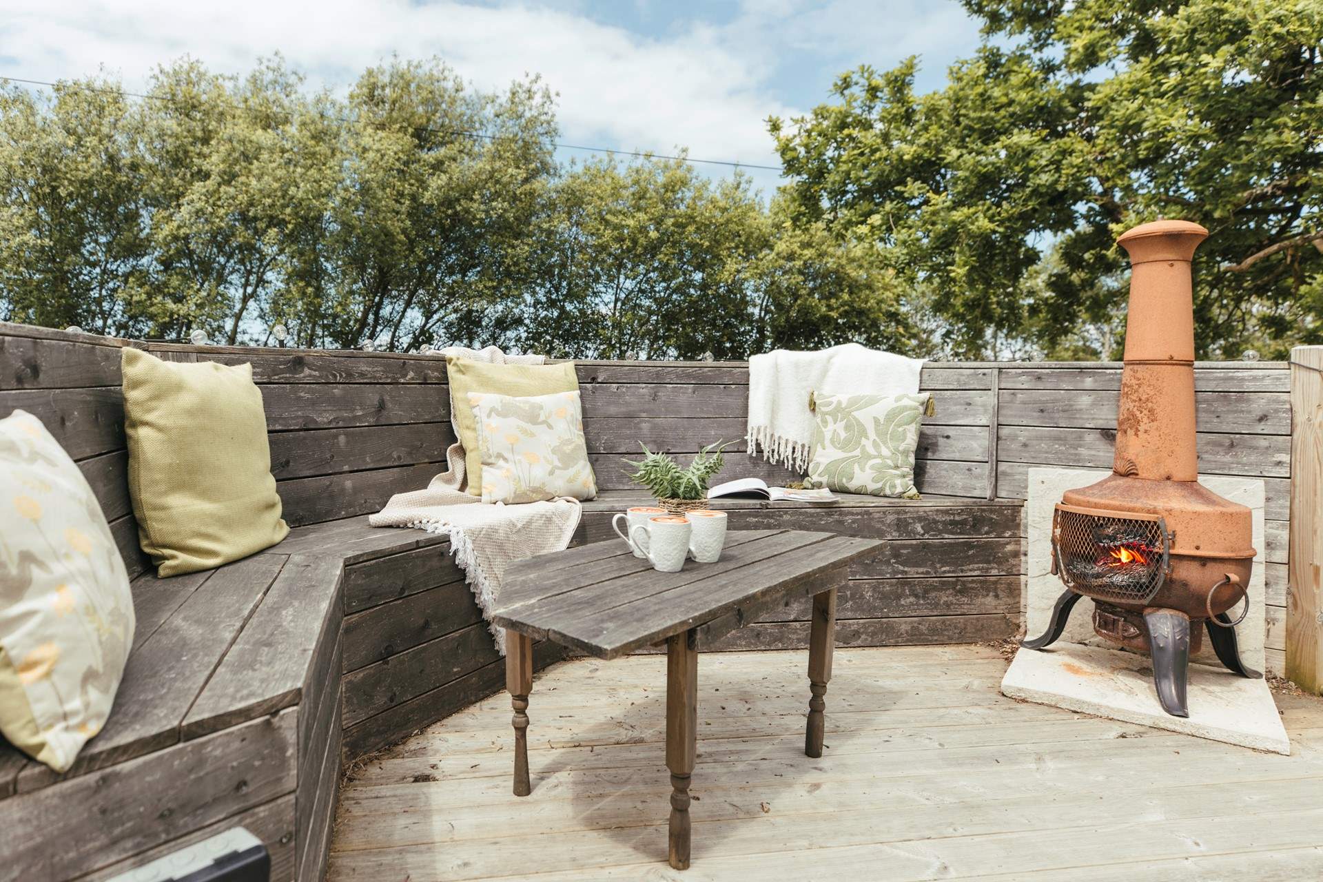 Take a pew in the tree platform and graze under the sky.